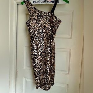 Girls’ size 14 black and gold sequin dress